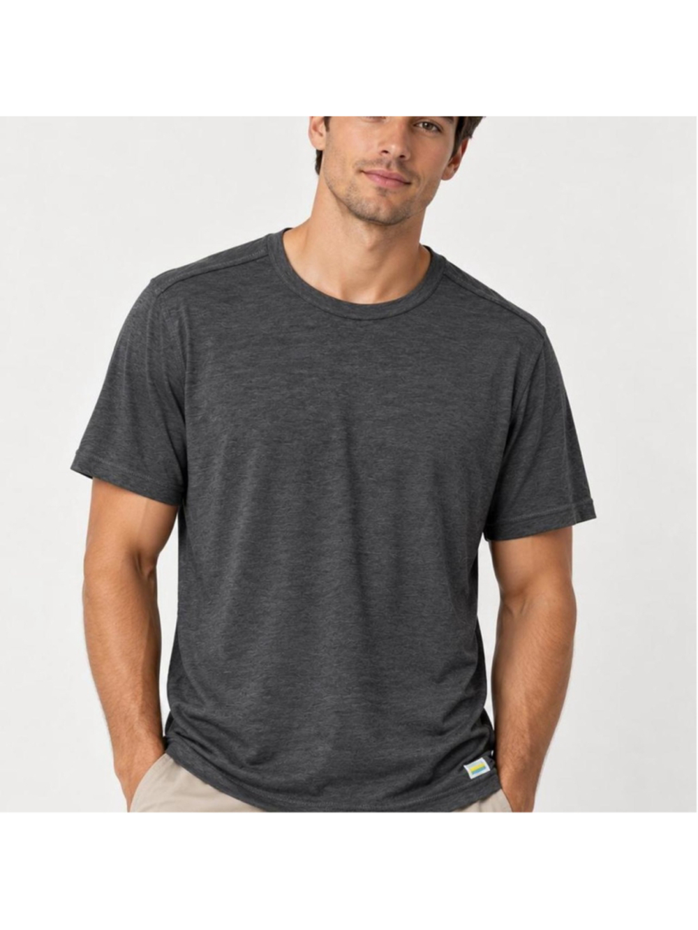 Vuori charcoal gray performance tee with a soft, lightweight feel and classic cr